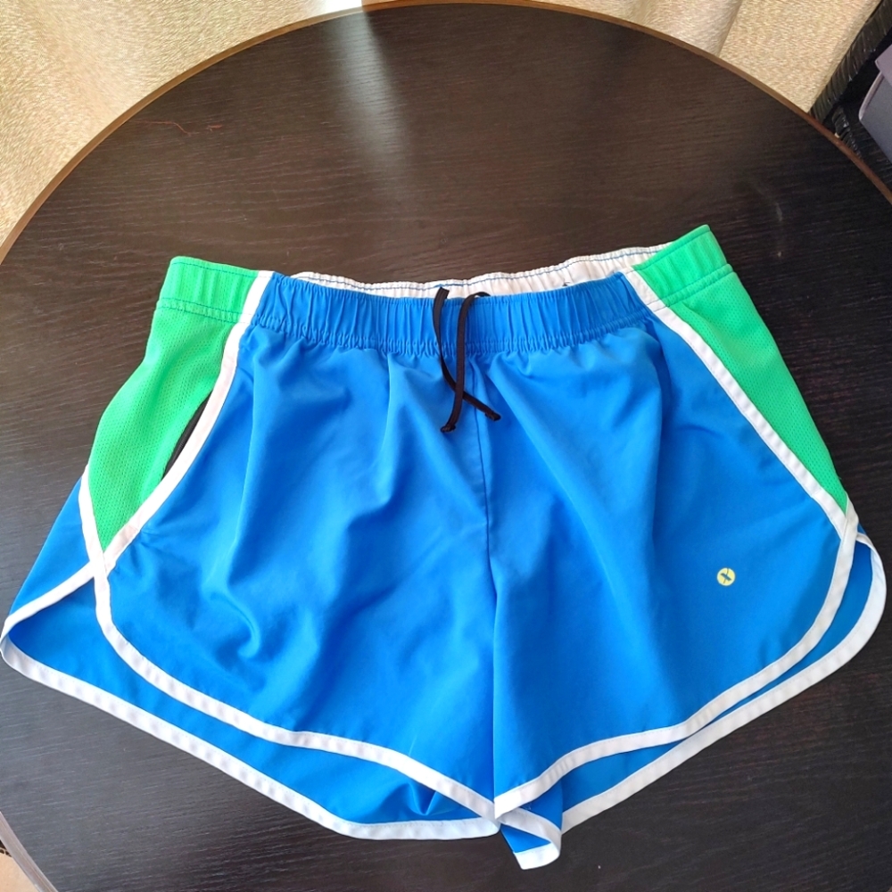 Xersion running or swim shorts. Built in brief. Size medium.